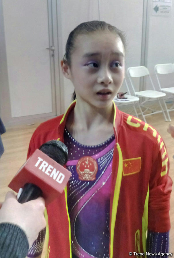 Çinli gimnast Dünya Kubokunda birinci yer tutmağa iddialıdır - FOTO