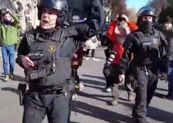 Makrona görə Barselonada polislə toqquşma oldu - VİDEO
