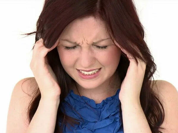 Gərginlik səbəbli baş ağrıları